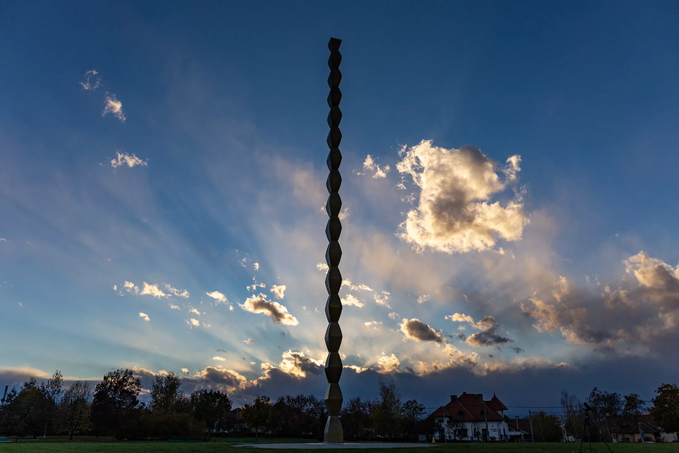 Epic view of the Constantin Brancusi's Infinity Column in the sunset.
