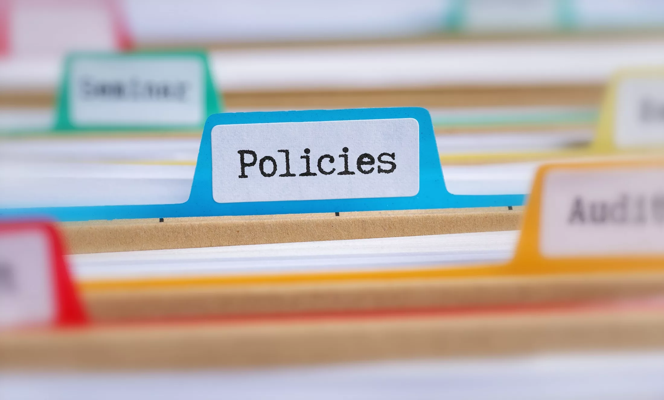 File,Folders,With,A,Tab,Labeled,Policies
