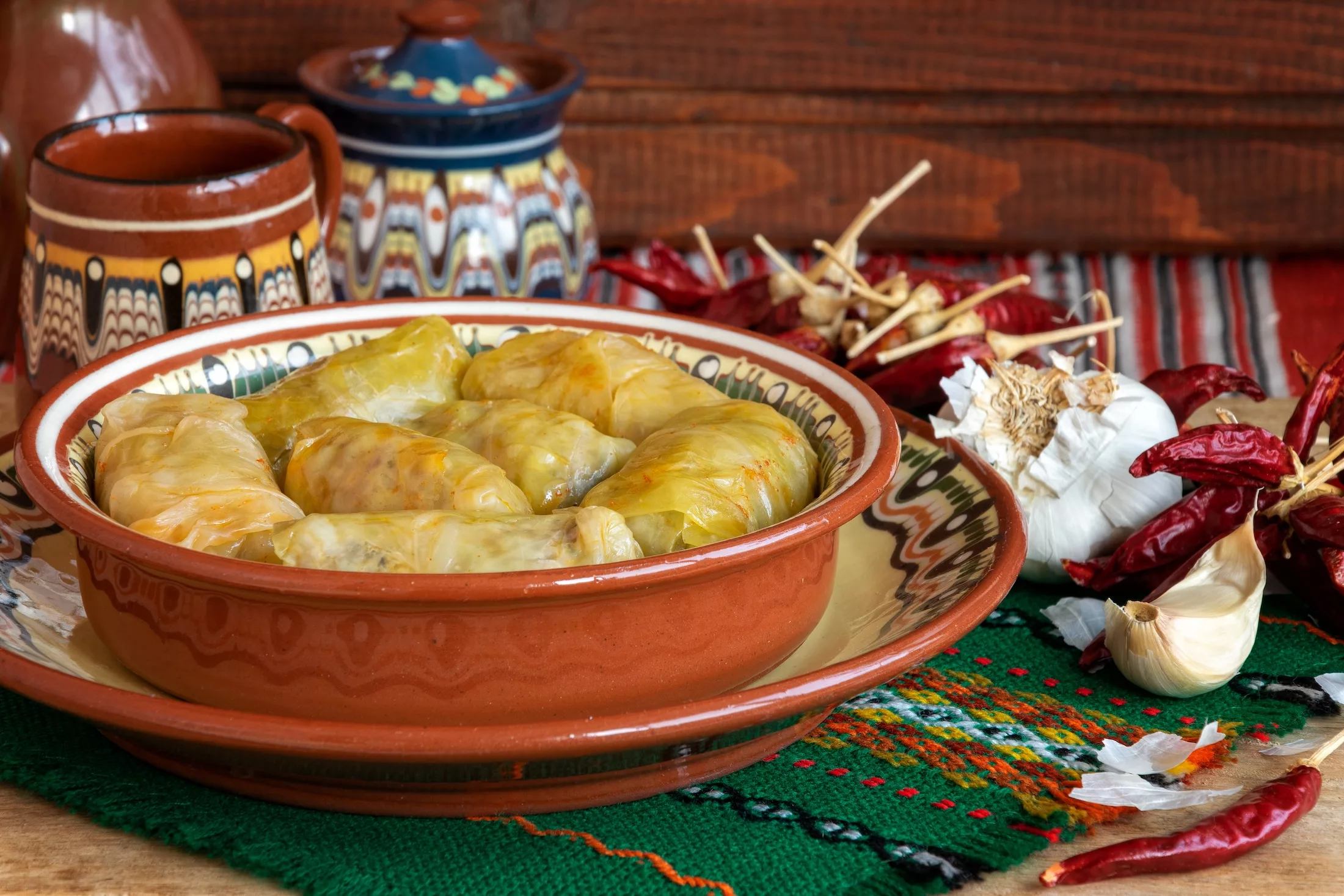 Sarma sarmale or dolma. Traditional Balkan cuisine stuffed cabbage leaves with minced meat and rice in ceramic dish.